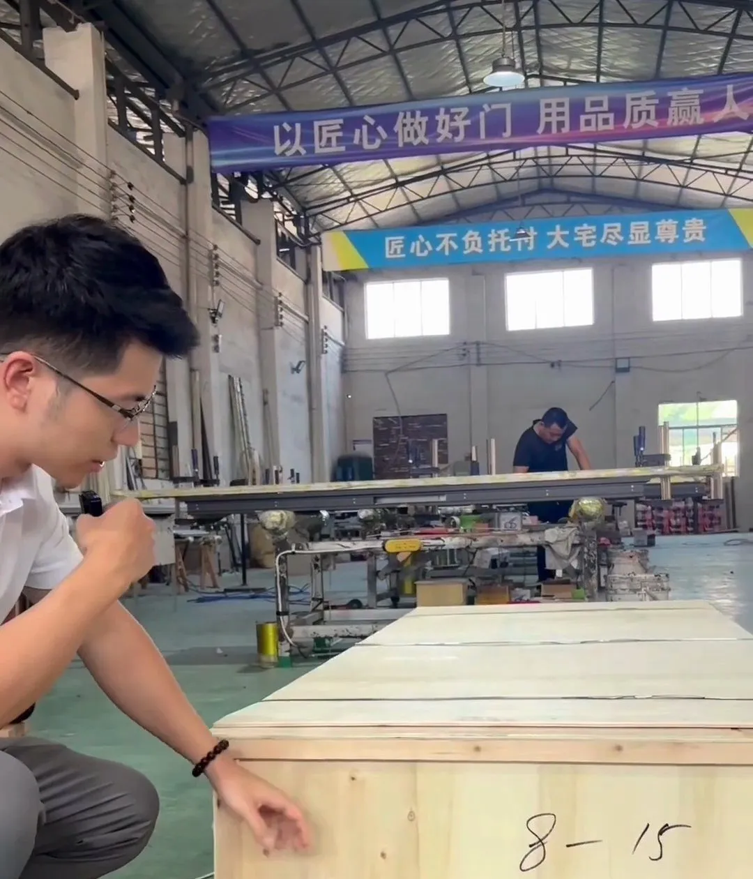 Protective wooden crate being prepared for a finished entrance door