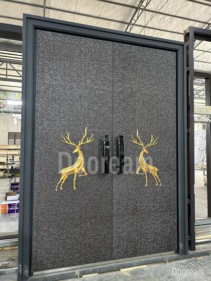 Textured double door with gold deer, photographed on our floor