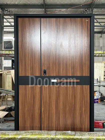 Walnut-print double door with a black band, photographed on our floor